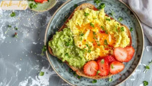 Healthy Avocado Toast Breakfast Plate with Eggs & Berries