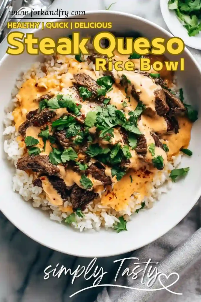 Steak queso rice bowl topped with melted cheese sauce and fresh cilantro over white rice