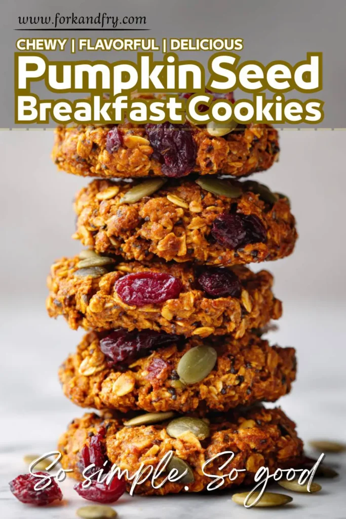 Chewy Pumpkin Breakfast Cookies with Oats Stack of pumpkin oat breakfast cookies with dried cranberries