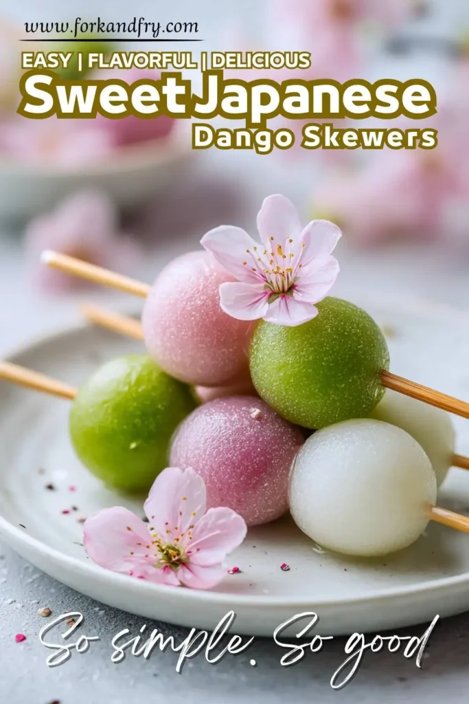 Close-up of 3-color hanami dango dessert on bamboo skewers