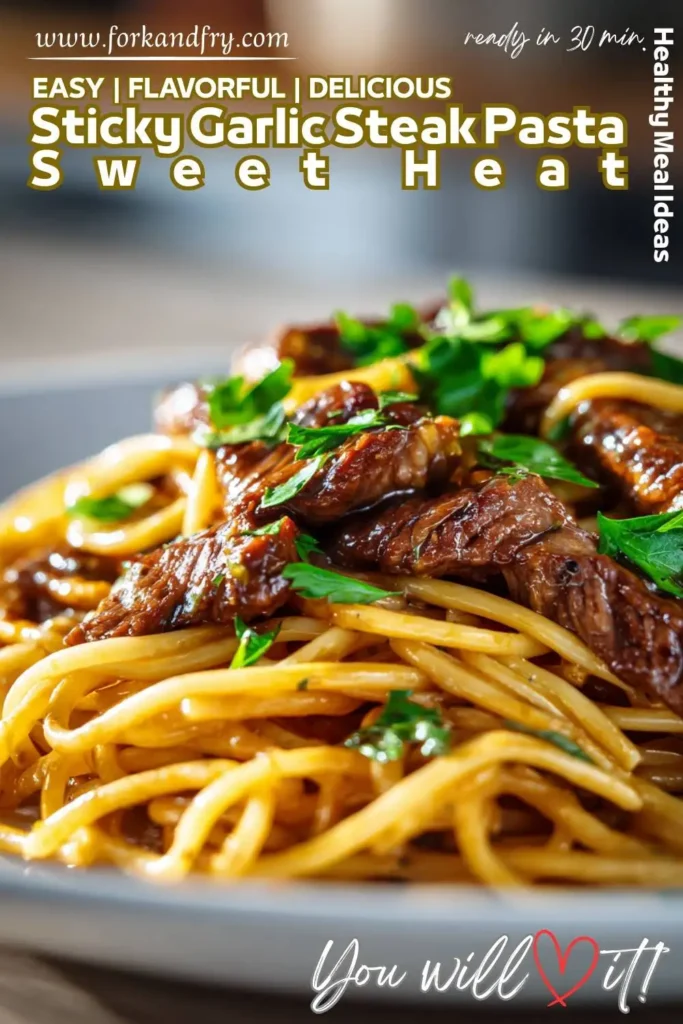 Two plates of sticky garlic steak pasta set on a cozy dinner table with candles