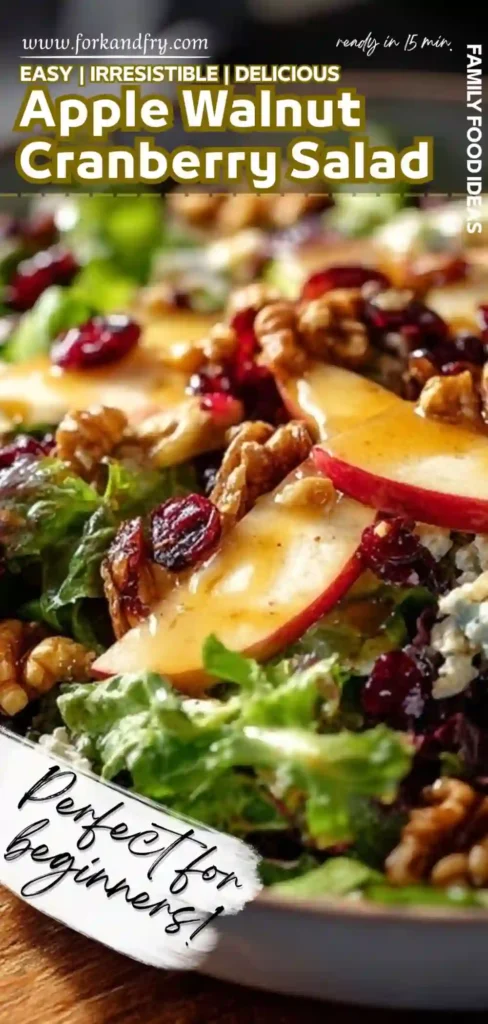 Fresh Apple Walnut Cranberry Salad Apple walnut cranberry salad with greens, honey vinaigrette, and blue cheese in vertical format