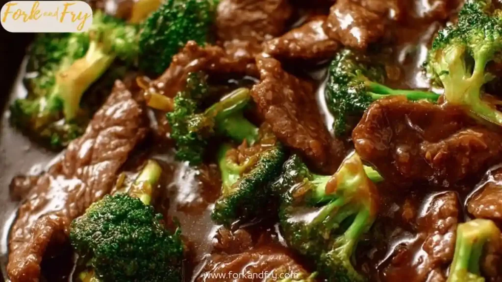 Savory beef and broccoli stir fry in rich brown sauce with tender slices of beef and vibrant green florets