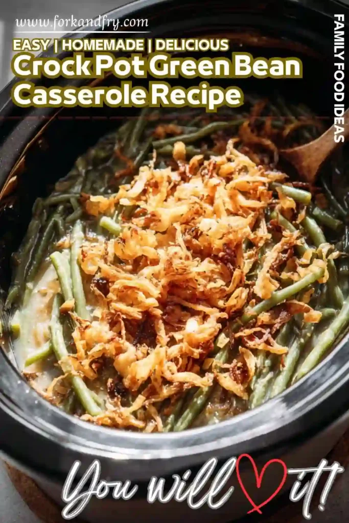 Crockpot green bean casserole topped with crispy fried onions and served with a wooden spoon