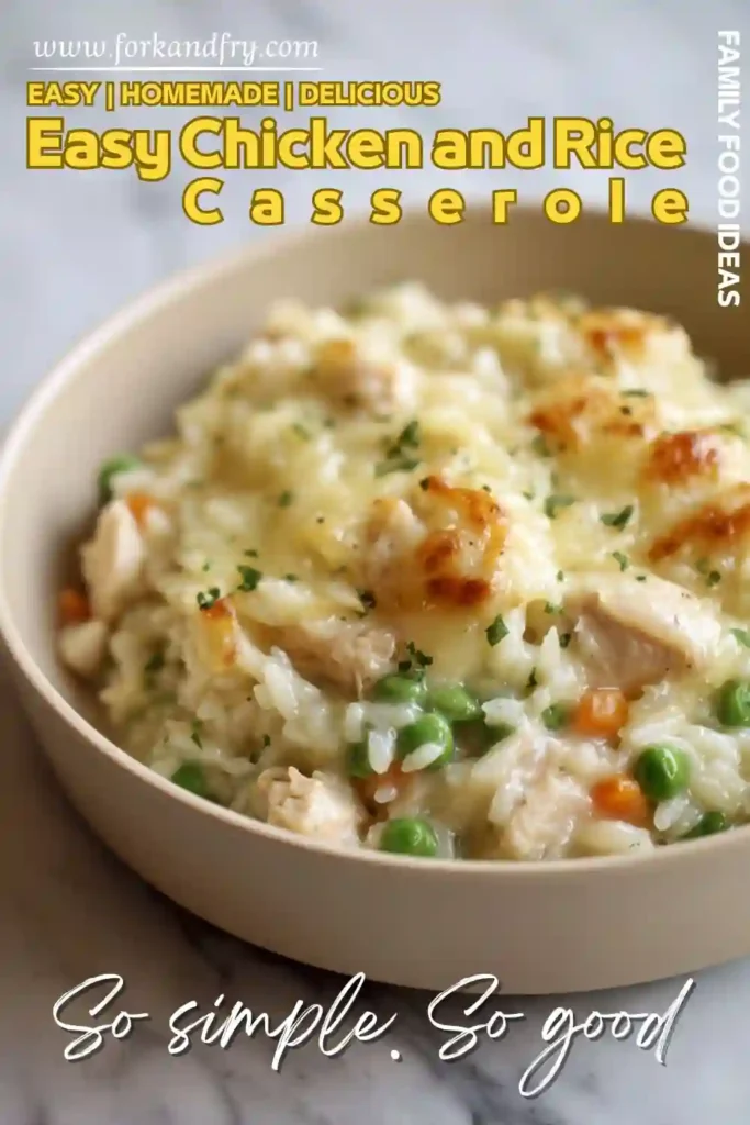 Easy Chicken and Rice Casserole asy chicken and rice casserole with melted cheese, peas, and carrots served in a beige bowl