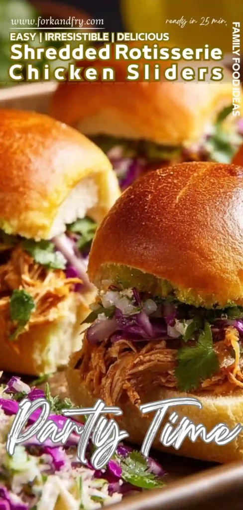 Shredded Rotisserie Chicken Sliders with Creamy Slaw closeup of shredded rotisserie chicken sliders with purple slaw on golden buns