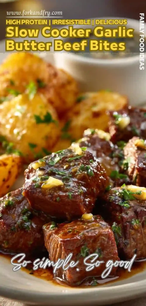 Slow cooker garlic butter beef bites with crispy potatoes and bold text overlay
