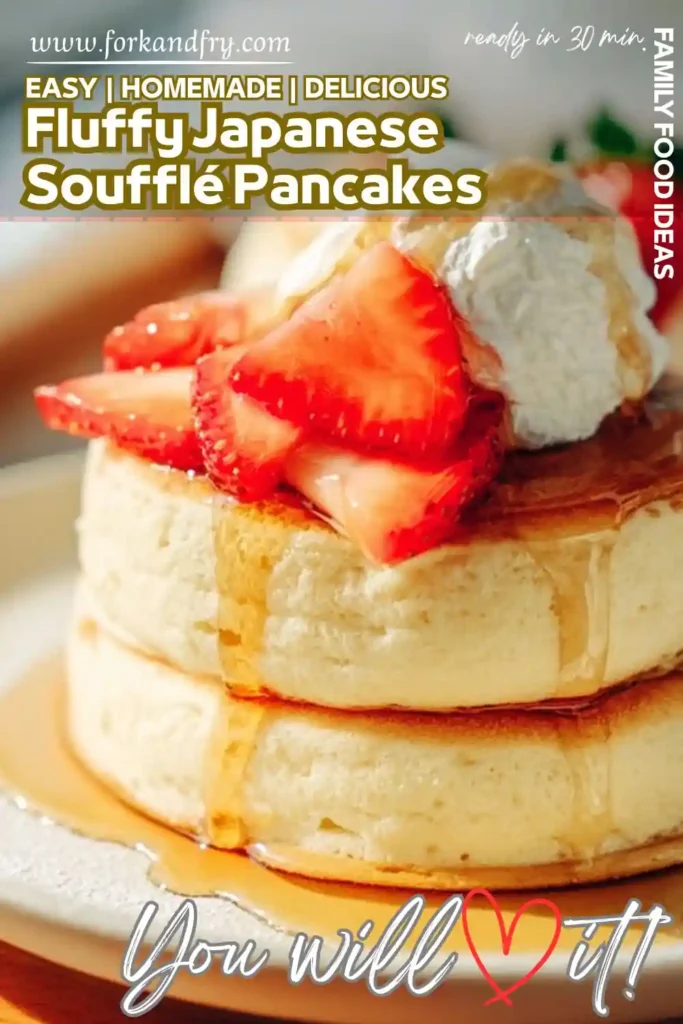 Tall fluffy Japanese soufflé pancakes topped with strawberries, whipped cream, and maple syrup drizzle