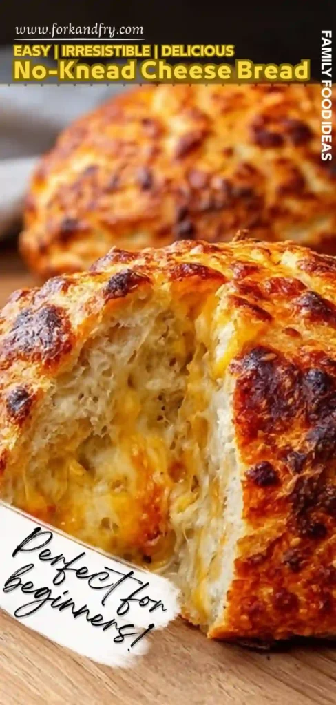 Easy No Knead Cheese Bread for Beginners tall vertical image of cheesy no knead bread torn open with melted cheese inside