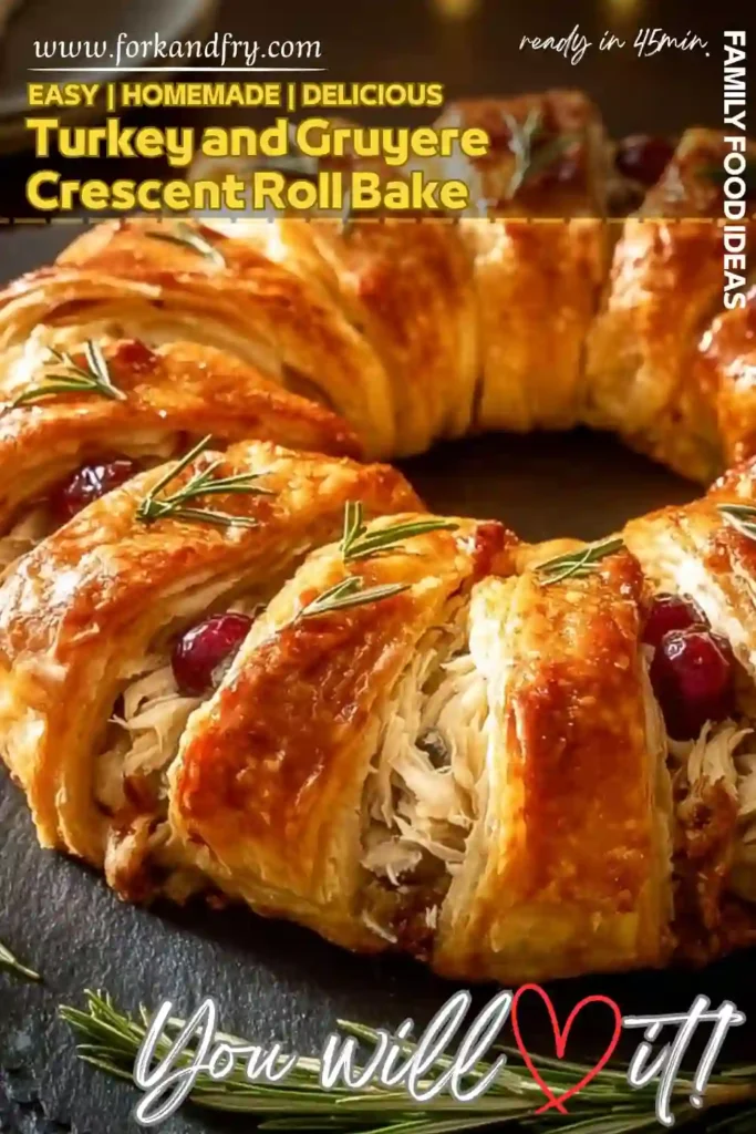 festive turkey and gruyere crescent roll ring with golden crust, cranberries, and rosemary