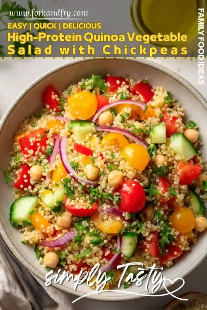 High-Protein Quinoa Salad with Chickpeas and Veggies Colorful quinoa salad with cherry tomatoes, cucumbers, chickpeas, and parsley in a bowl