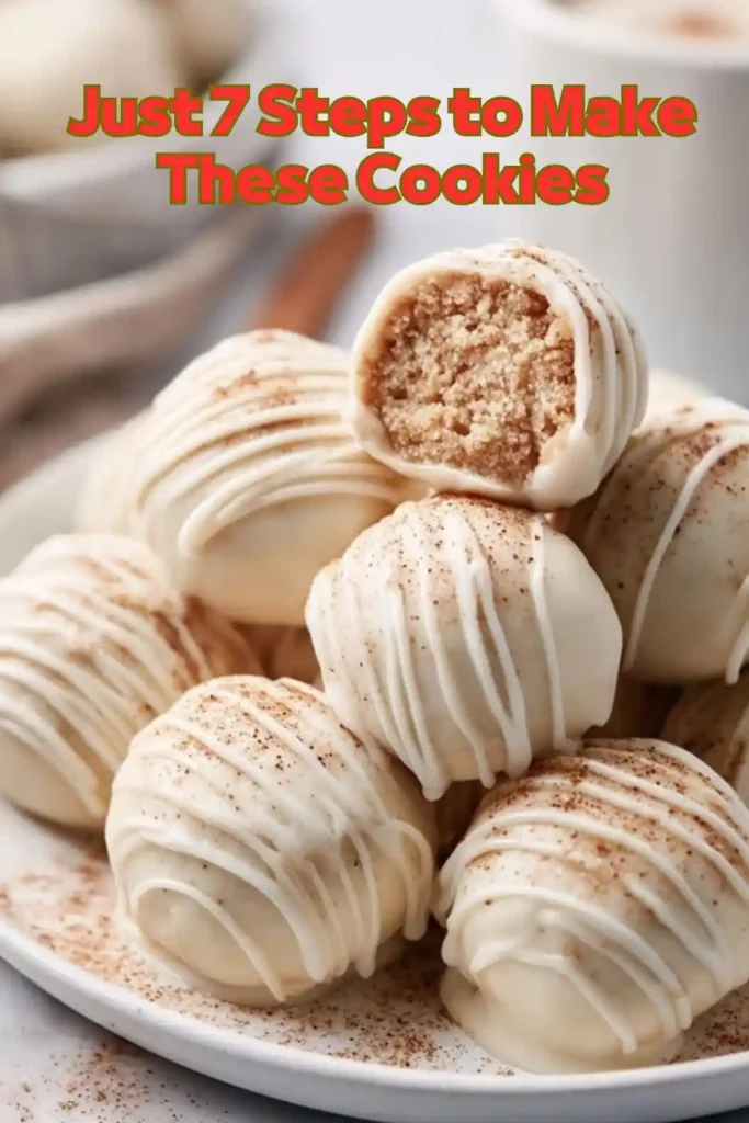 White Chocolate Cookie Truffles You Can Make in 7 Steps White chocolate truffles with cookie center on white plate sprinkled with cinnamon stacked and styled vertically
